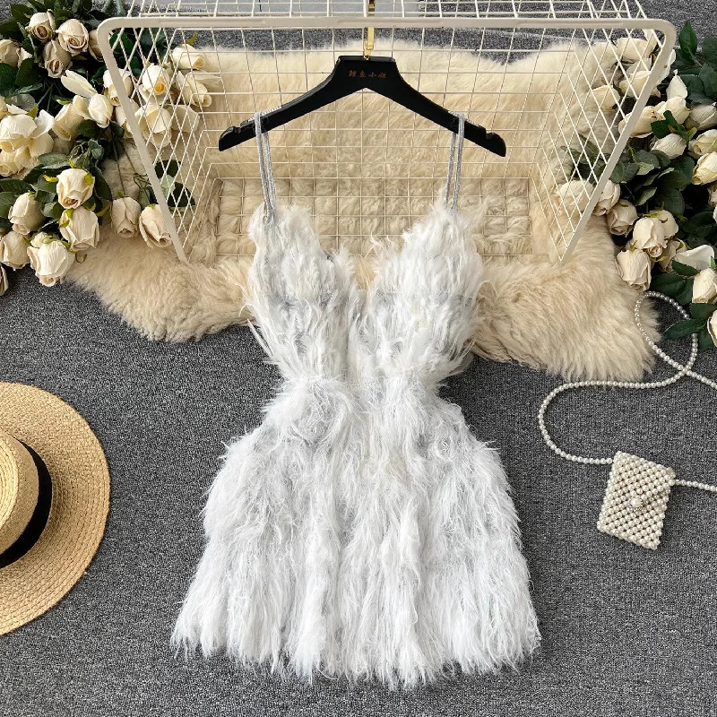 Wrap dress – Dress that wraps around the body and ties at the waist, creating a flattering and adjustable fit.Wrap dress – Dress that wraps around the body and ties at the waist, creating a flattering and adjustable fit.super fairy design feather tassel halter dress hot girl short skirt    S4536
