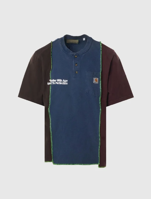 Henley – T-shirt with a buttoned placket (usually a few buttons near the collar)Henley – T-shirt with a buttoned placket (usually a few buttons near the collar)CARHARTT TRAVELLIER CAR TEE