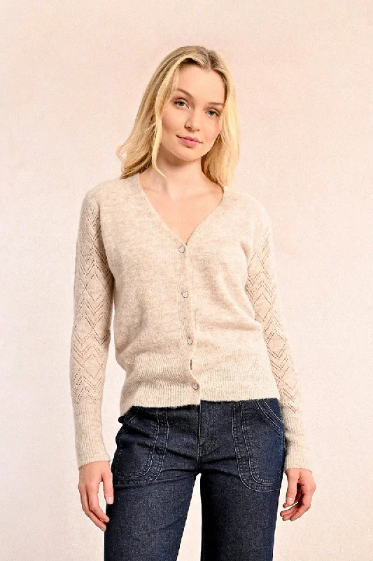 These keywords help define the specific style or feel of a sweater, allowing for more targeted searches or descriptions. Are you looking for a particular sweater style or just exploring different options?These keywords help define the specific style or feel of a sweater, allowing for more targeted searches or descriptions. Are you looking for a particular sweater style or just exploring different options?Pointelle Sleeve Cardigan with Heart Buttons in Cream
